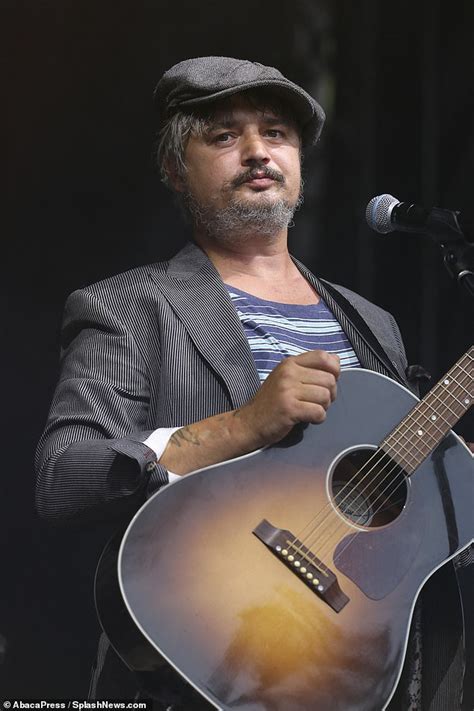 Pete Doherty tips his flat cap after performing at the annual Make Music Day concert in Paris ...