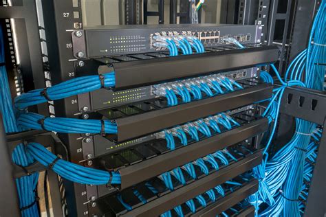 Network switch and ethernet cables in rack cabinet | RTC Business Solutions