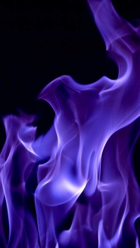 purple fire flames on a black background