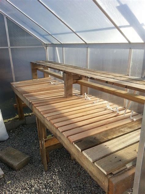 My diy greenhouse shelf made from pallets and bunky boards. | Diy greenhouse shelves, Greenhouse ...