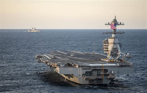 The USS Gerald R. Ford (CVN 78) and the Italian aircraft carrier ITS Cavour (CVH 550) transit ...