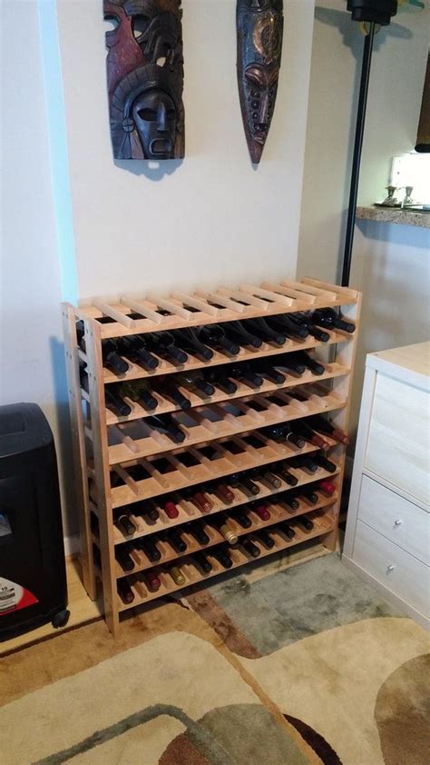 The new-to-me wine rack is now set up! | Elizabeth K. Joseph | Flickr