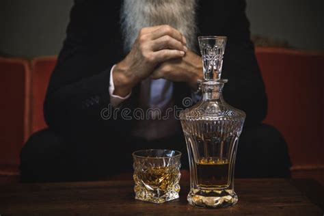 Handsome and Bearded Senior Man Drinking Whiskey Stock Image - Image of ...