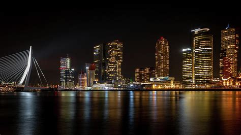 Rotterdam Skyline at Night Photograph by Raymond Voskamp