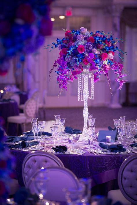 Pin by Kelly B on Purple | Floral event design, Wedding florist, Spring wedding