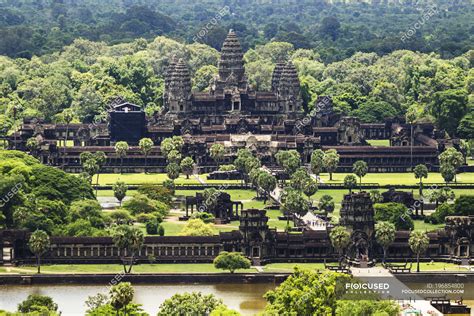 Aerial view of Angkor Wat, as seen from a hot air balloon; Siem Reap, Cambodia — asia, water ...