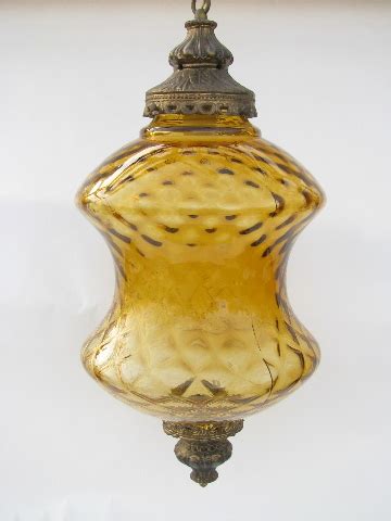 Retro vintage curvy swag lamp, groovy 60s amber glass hanging light