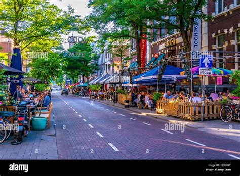 ROTTERDAM, NETHERLANDS, AUGUST 5, 2018: Sunset view of Witte de Whitstraat street in Rotterdam ...