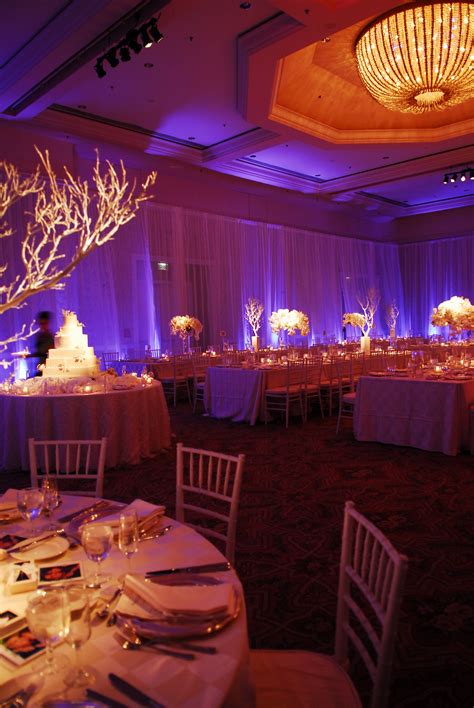 Enhanced Lighting completely draped the ballroom of the Fairmont San Jose with white chiffon ...