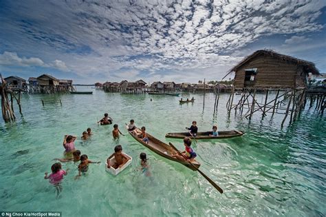 Bajau people live in the middle of the sea on house boats without nationality - Cruisers ...