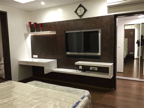 Master bedroom tv unit studio stimulus modern style bedroom | homify | Bedroom tv wall, Tv in ...