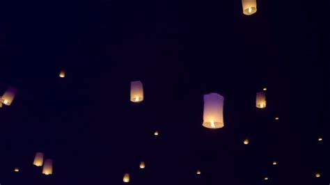 Sky Lanterns Fly Into The Night Sky Stock Video Footage - Storyblocks Video | Sky lanterns ...