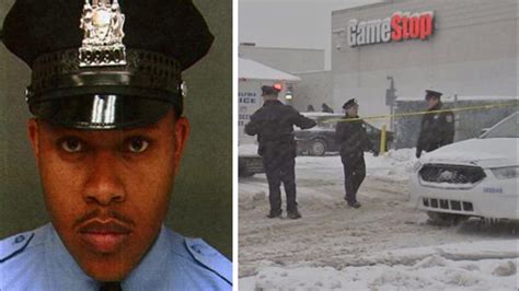 Philadelphia police officer fatally shot while trying to stop robbery ...