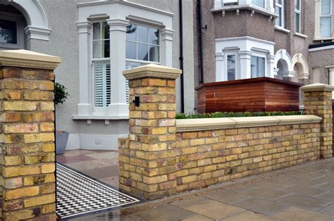 Brick garden wall Imperial Yellow stock cap coping bespoke storage London Clapham Balham ...