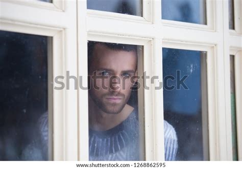 Guy Looks Through Window Stock Photo 1268862595 | Shutterstock