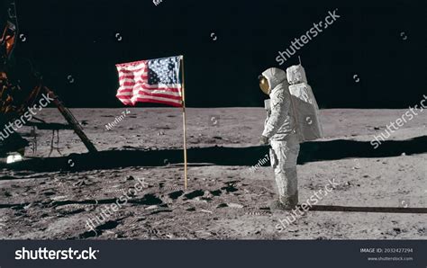 Astronaut On Moon By The American Flag