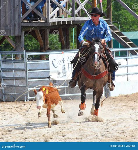 The Cowboy In A Calf Roping Competition. Editorial Stock Image - Image: 33216864