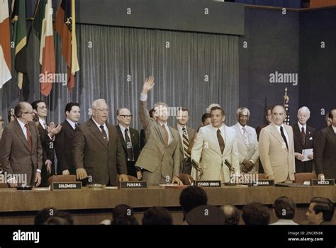 President Jimmy Carter with others while signing Panama Canal Treaty in Panama on June 16, 1978 ...