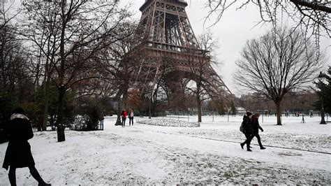 Paris' Famed Eiffel Tower Closes in Snow and Ice | The Weather Channel