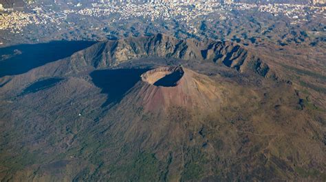 Tourist rescued after falling into Mount Vesuvius while trying to reach phone | World News | Sky ...