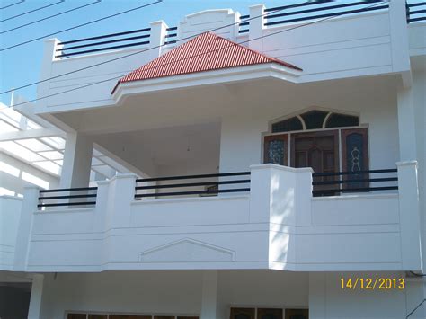 A Duplex house ,Balcony with Sloped roof &Wooden door/window frames - GharExpert