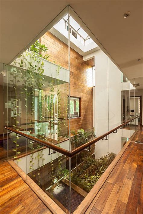 I love atriums. Such a beautiful way to enjoy a garden while blending your indoor and outdoor ...