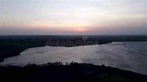 Drone Flying Over the Great Plain Forests and Lakes of Long Thanh Lakes at Dusk in Vietnam Stock ...