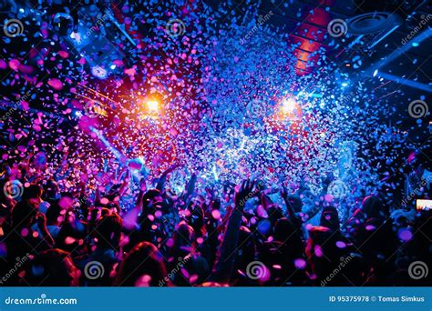 Night Club Silhouette Crowd Hands Up at Confetti Steam Stage Editorial ...