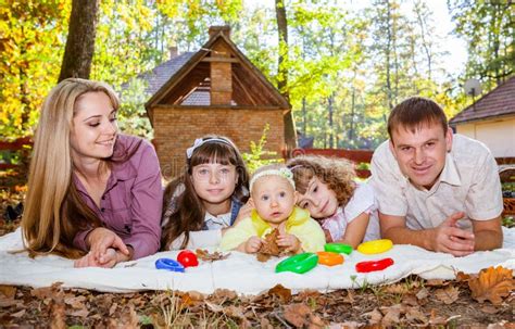 Smiling Family with Children Outdoors Stock Image - Image of caucasian, outdoors: 28227203