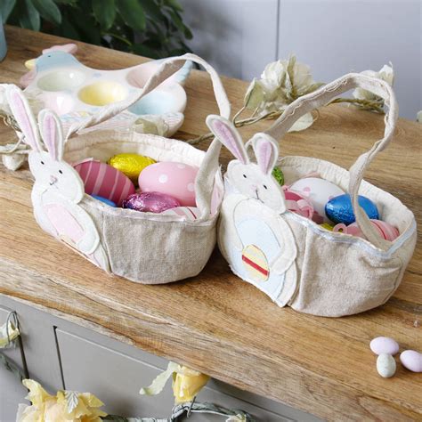 pink and blue easter egg hunt baskets by dibor | notonthehighstreet.com