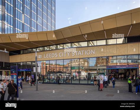 The exterior of the Leeds City railway station crowded entrance in England, UK Stock Photo - Alamy