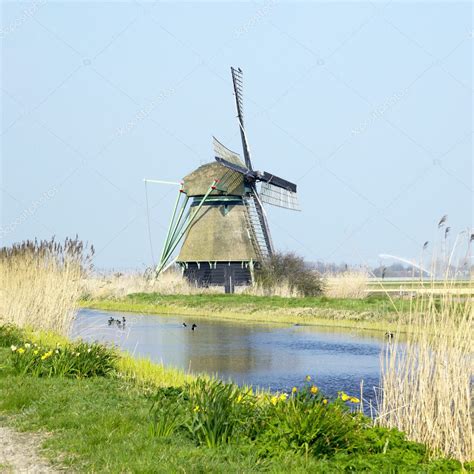 Windmill in Netherlands — Stock Photo © phb.cz #2731925