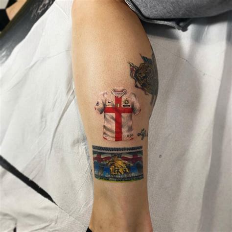 Inter Milan shirt tattooed on the calf, micro-realistic