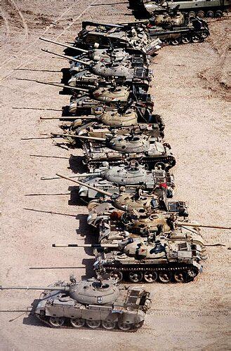 The Gulf War | Desert Storm ~ British troops guard captured Iraqi armor and weapons in the ...