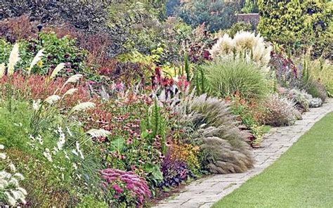 Slope idea | Ornamental grass landscape, Ornamental grasses, Ornamental grasses for shade