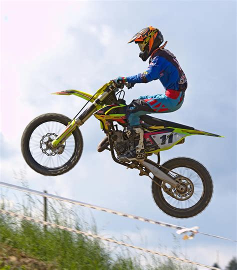 Person Doing Stunt in Motocross Dirt Bike · Free Stock Photo