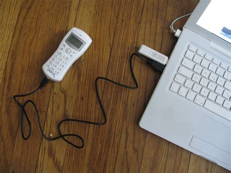 Charging the DialogPlus | The cordless phone charges through… | Flickr