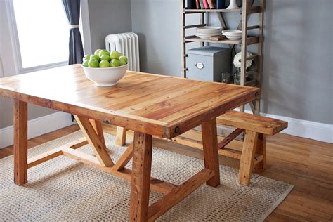 Reclaimed wood farmhouse dining table and bench by UniqueIndustry