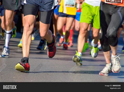 Marathon running race, runners feet on road Stock Photo & Stock Images | Bigstock