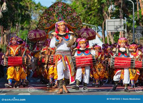 Group of Balinese Men in Traditional Costumes Play Gamelan Music ...