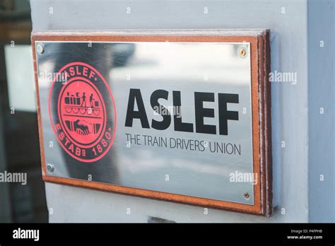 Plaque showing the logo of ASLEF, the train drivers' union, outside it HQ Stock Photo - Alamy