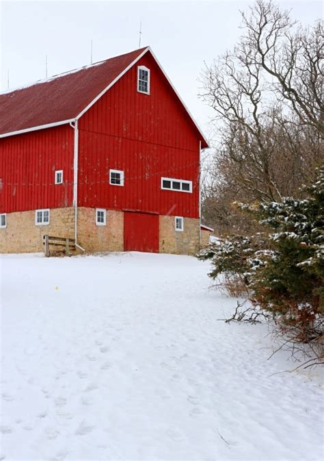 Red Barn in Snow: The Best Winter Scene - Town & Country Living
