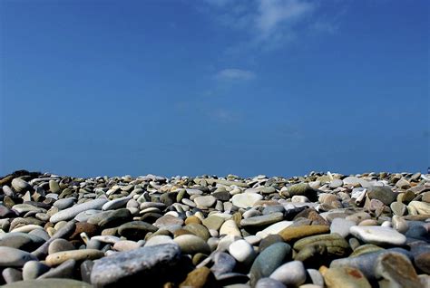 Sea pebbles Photograph by Natalia Mur