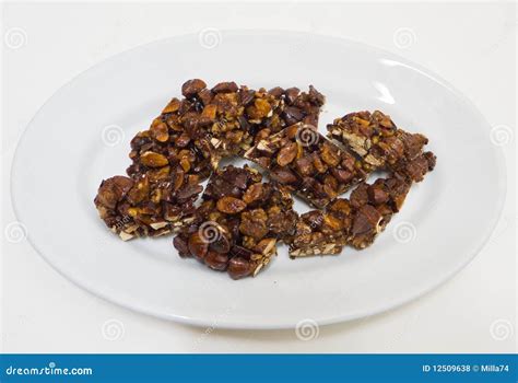 Chocolate almond nougat. stock photo. Image of caramelized - 12509638