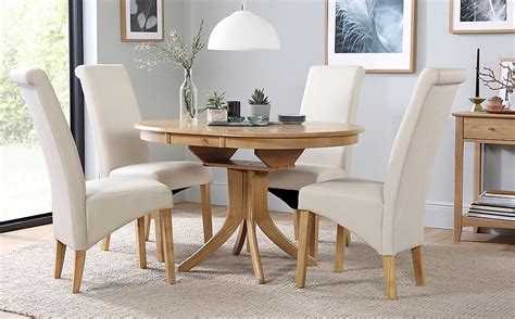 Hudson Round Oak Extending Dining Table with 6 Richmond Cream Leather Chairs | Furniture Choice