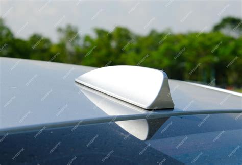 Premium Photo | Selective focus picture of shark fin radio antenna on car roof