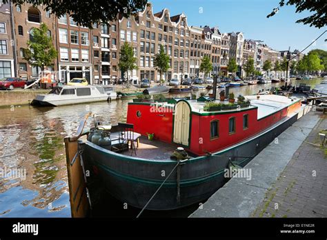 Houseboat barge, Amsterdam canal - Holland Netherlands Stock Photo - Alamy