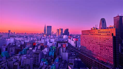 Download wallpaper 3840x2160 city, aerial view, buildings, dusk, purple 4k uhd 16:9 hd background
