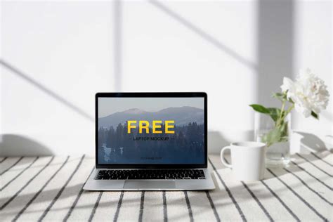 Free Laptop on a Table Mockup