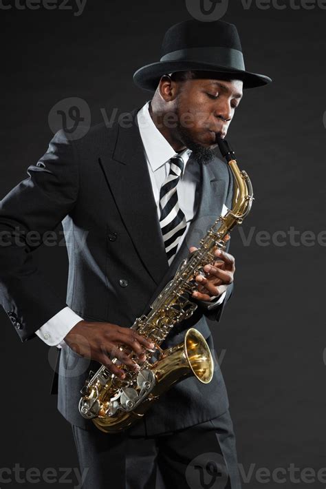 Black american jazz saxophone player. Vintage. Studio shot. 1217974 ...